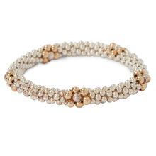 Load image into Gallery viewer, This photo shows our Sterling Silver Bracelet with Gold Flower Design
