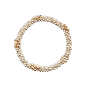 This photos shows our Sterling Silver Bracelet with Gold Flower Design from a different angle.