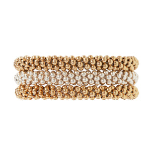 This is an example of our Classic Trio which includes three bracelets, sterling silver, 14 Kt gold, and rose gold.