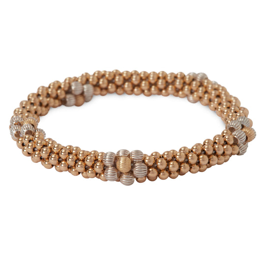 Beautiful 14 kt gold-filled bracelet with Sterling Silver flower design.