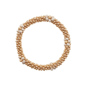 Beautiful 14 kt gold-filled bracelet with Sterling Silver flower design.